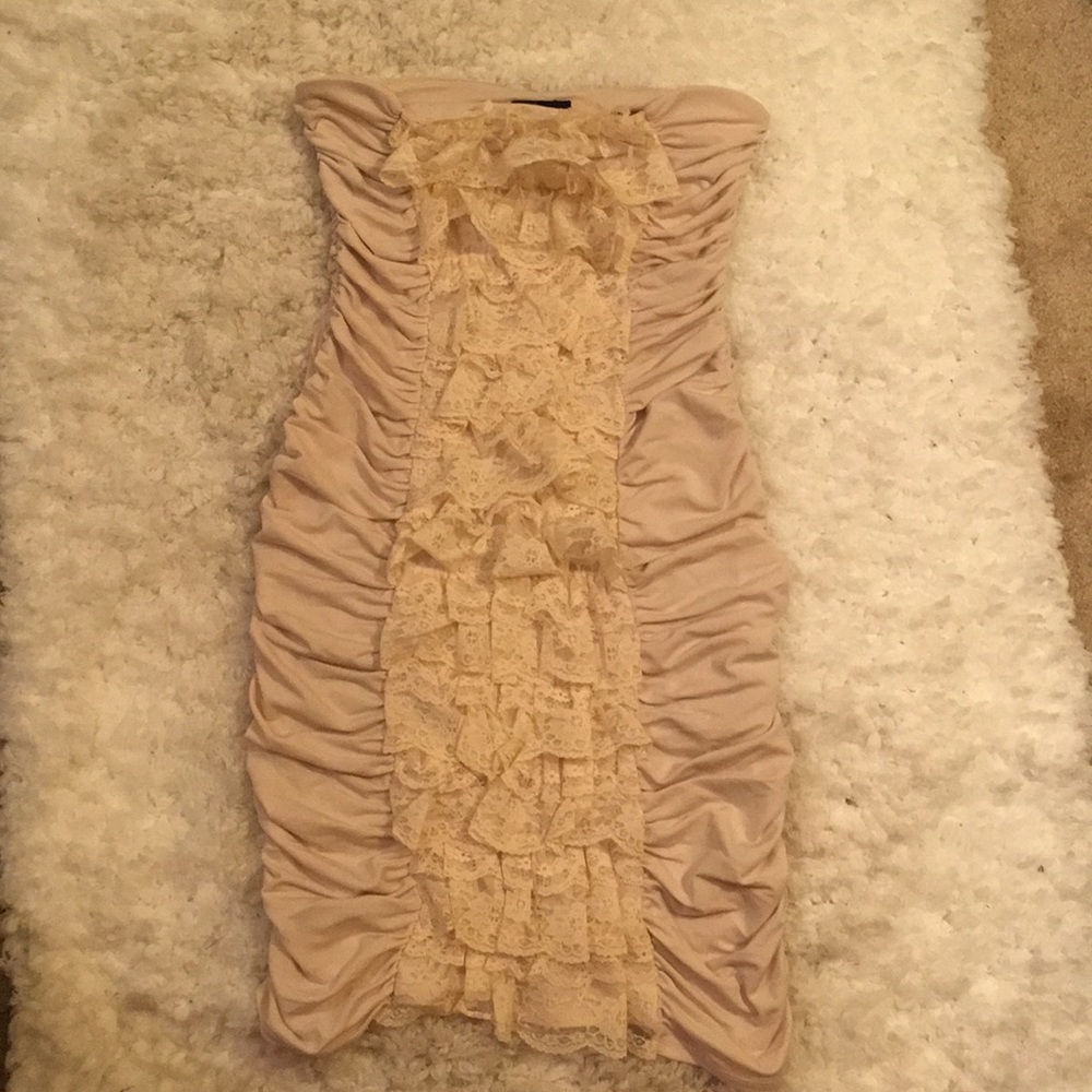 Rushed dress cream color slinky fabric